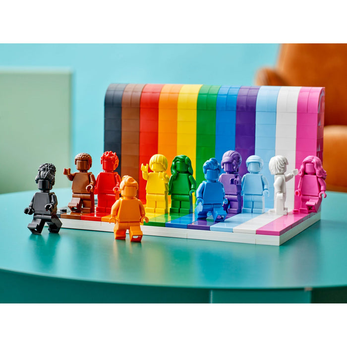 LEGO 40516 Everyone Is Awesome minifigures posed in front of the display