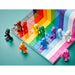 LEGO 40516 Everyone Is Awesome minifigures arranged across the rainbow base