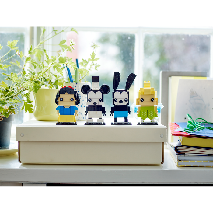 LEGO Brickheadz 40622 Disney 100th Celebration figures displayed on a windowsill