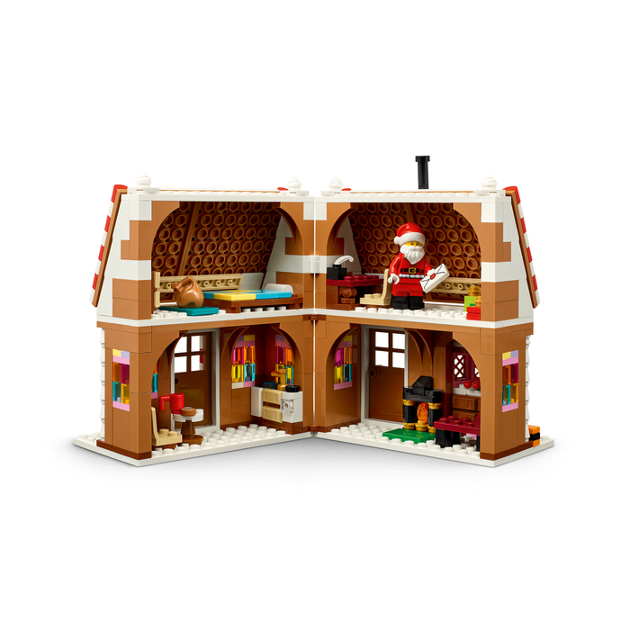 LEGO Seasonal 40809 Festive Gingerbread House opened house revealing Santa's desk, fireplace and bedroom