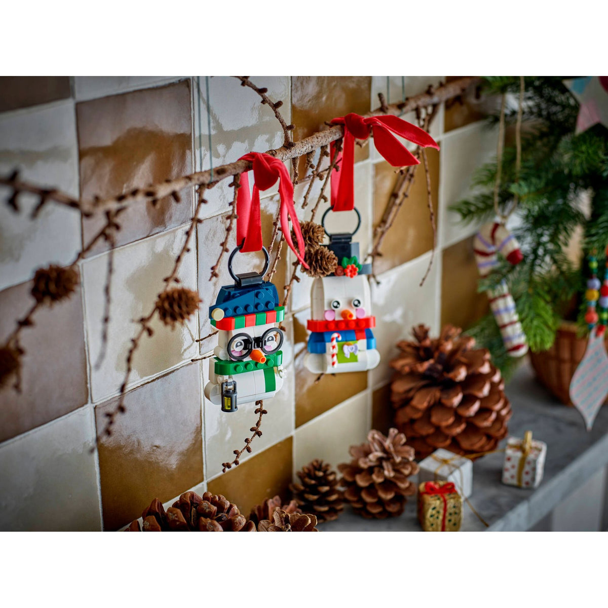 LEGO Seasonal 40812 Snowman Ornaments displayed on a Christmas tree