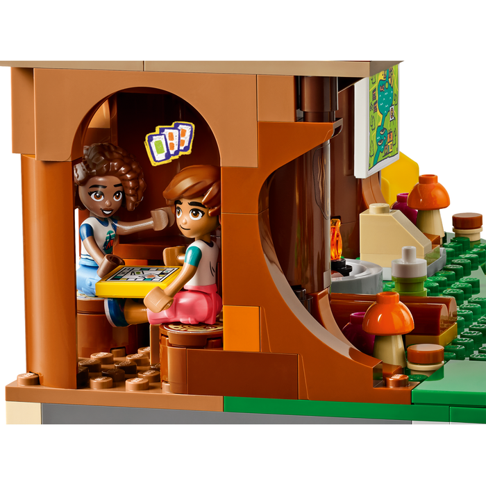 LEGO Friends 42631 Adventure Camp Tree House mini-dolls playing cards inside the tree house